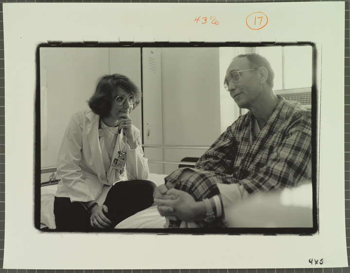 Portrait of Beatrice Engstrand, Class of 1982, sitting with a patient