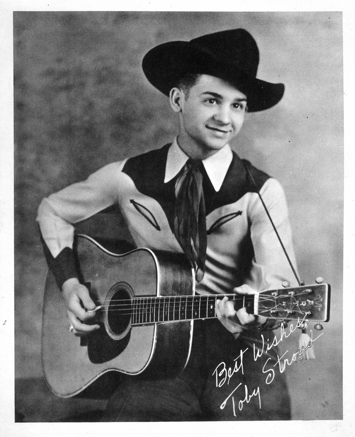 Toby Stroud holding a Martin Model D-45 guitar | Lehigh Preserve